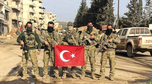 Οι Τούρκοι στην Αφρίν: Καίνε, καταστρέφουν και κρεμάνε σημαίες (vid)